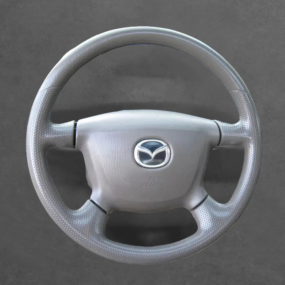 Griffowl Steering Wheel Cover for DIY Pickup Mazda BT-50 BT 502006-2011. Perfect grip with our steering wheel wrap and custom interior touch.