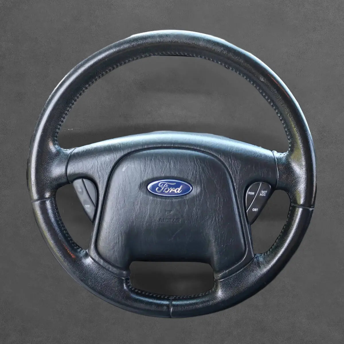 Griffowl Steering Wheel Cover for Personalized SUV Ford Escape 2001-2007. Perfect grip with our steering wheel wrap and custom interior touch.