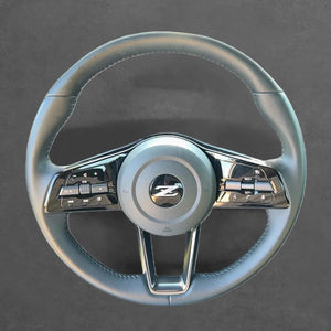 Griffowl Steering Wheel Cover for Tailored Coupe Nissan Z 2021-2024. DIY kit includes hand-sewn wrap for luxury interior mods.