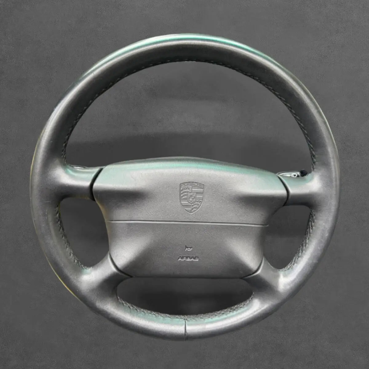 Griffowl Steering Wheel Cover for Tailored Coupe Porsche 996 993 986 Boxster 1994-1999. Elevate your interior with Griffowl's wrap and stitch kit.