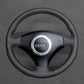 Griffowl Steering Wheel Cover for Bespoke Hatchback Audi A2 1999-2005. Compact, hand-sewn DIY wrap for quick interior mods and grip upgrade.