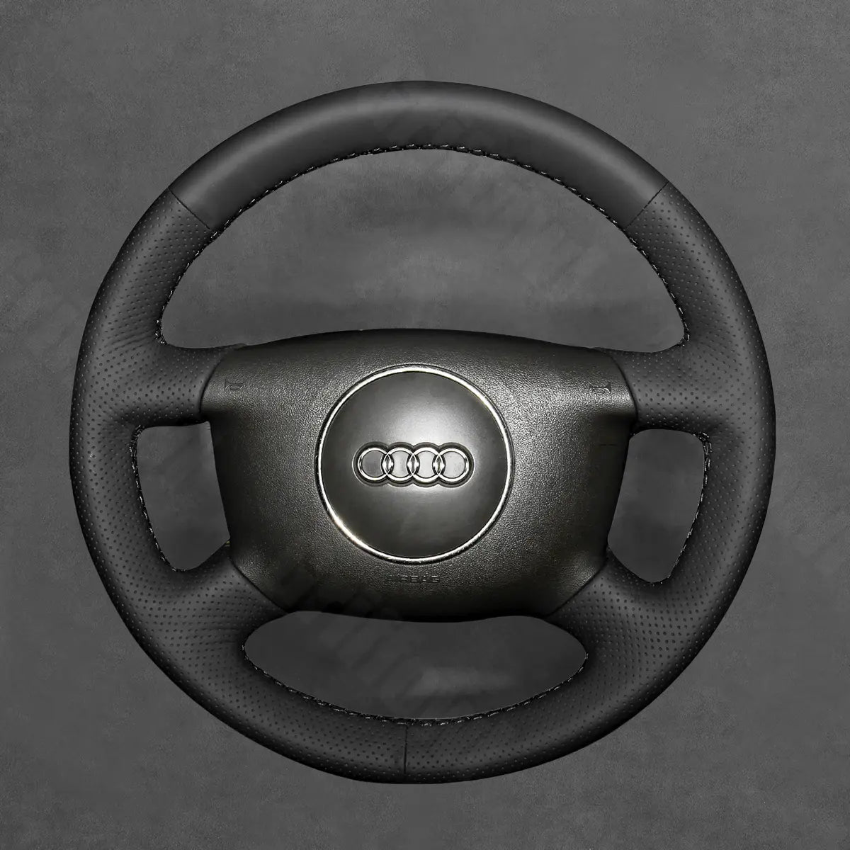 Griffowl Steering Wheel Cover for Bespoke Hatchback Audi A2 2000-2005. Compact, hand-sewn DIY wrap for quick interior mods and grip upgrade.