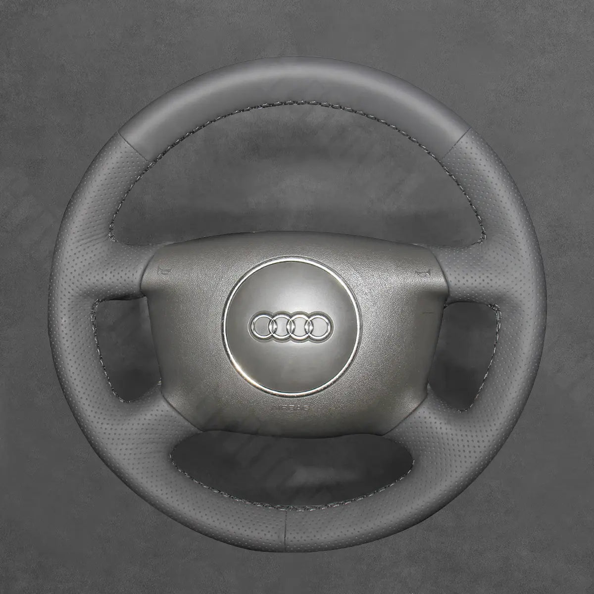 Griffowl Steering Wheel Cover for Bespoke Hatchback Audi A2 2000-2005. Compact, hand-sewn DIY wrap for quick interior mods and grip upgrade.