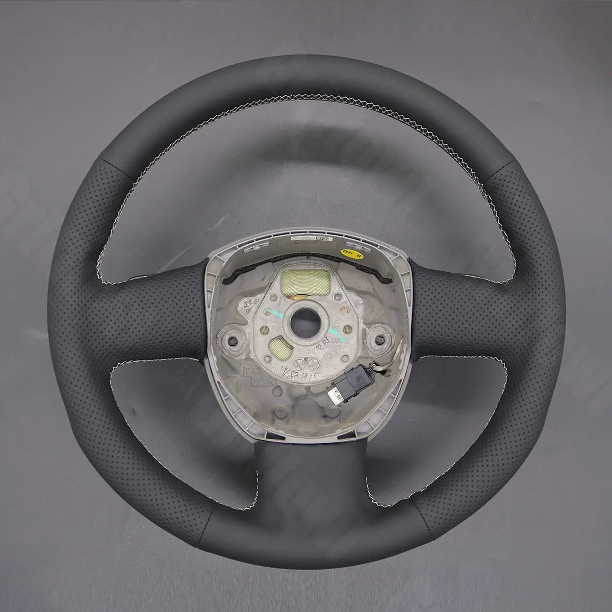 Griffowl Steering Wheel Cover for Bespoke Hatchback Audi A3 8P hatchback 2005-2013. Hand-sewn kit for drivers seeking precision and comfort.