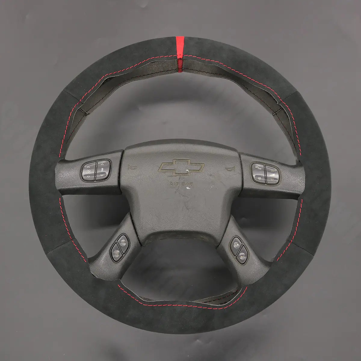Griffowl Steering Wheel Cover for Bespoke Hatchback Chevrolet Chevy Express 2003-2009. Elevate your interior with Griffowl's wrap and stitch kit.
