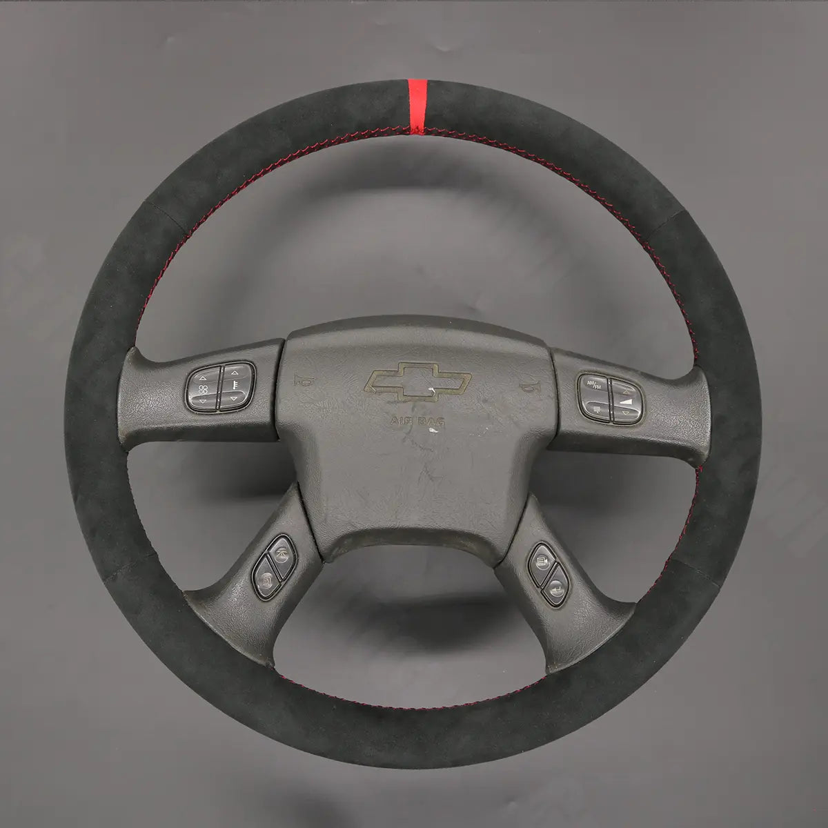 Griffowl Steering Wheel Cover for Bespoke Hatchback Chevrolet Chevy Express 2003-2009. Elevate your interior with Griffowl's wrap and stitch kit.
