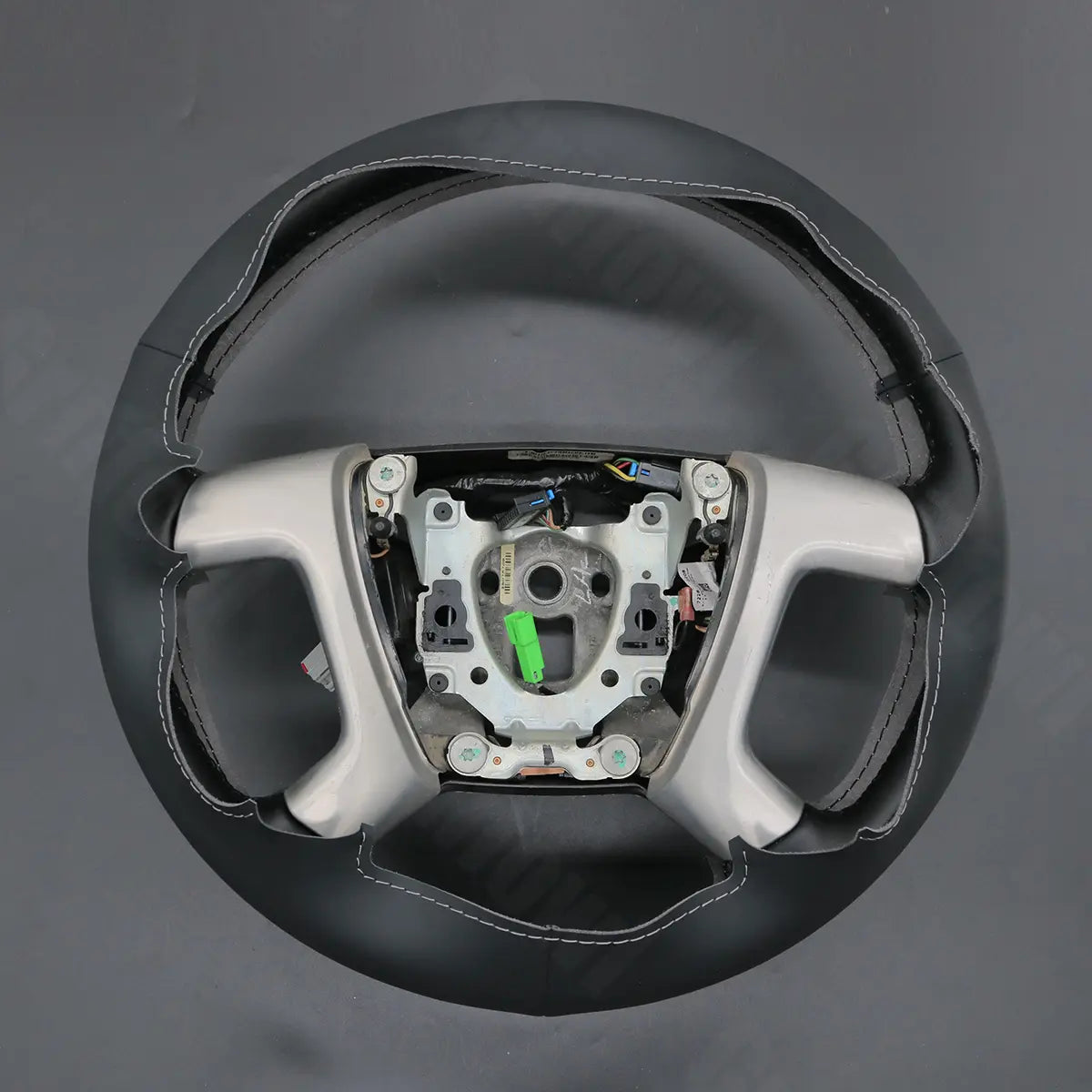 Griffowl Steering Wheel Cover for Bespoke Hatchback Chevrolet Chevy Express 2010-2019. Elevate your interior with Griffowl's wrap and stitch kit.
