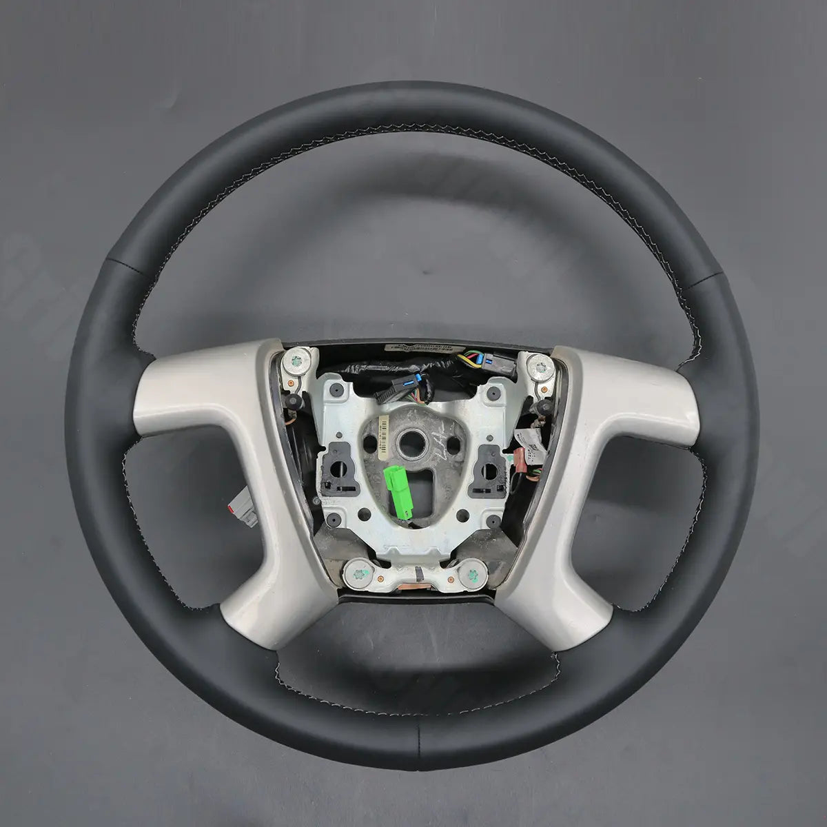 Griffowl Steering Wheel Cover for Bespoke Hatchback Chevrolet Chevy Express 2010-2019. Elevate your interior with Griffowl's wrap and stitch kit.

