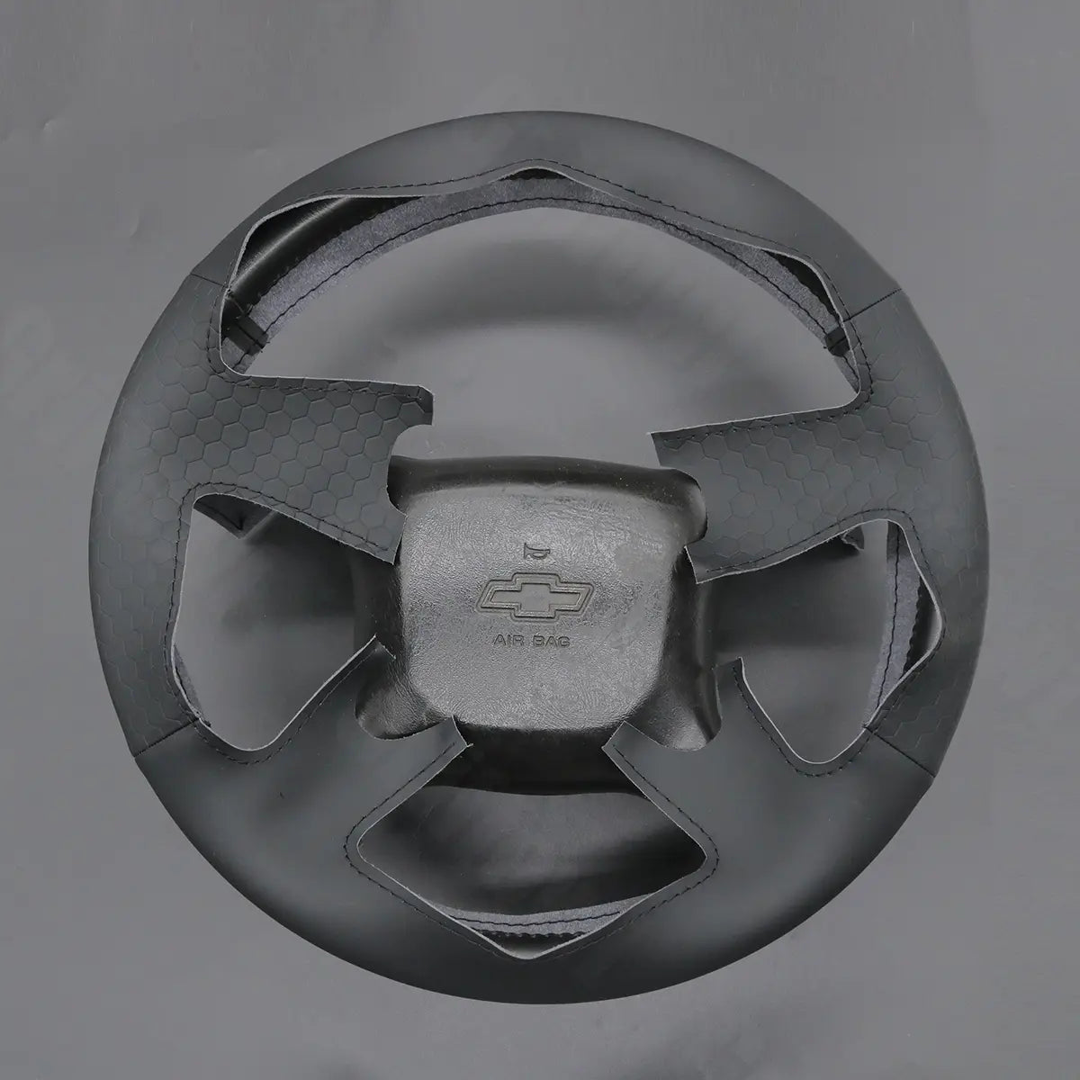 Griffowl Steering Wheel Cover for Bespoke Hatchback Chevrolet Chevy Express Astro 1999-2005. Elevate your interior with Griffowl's wrap and stitch kit.

