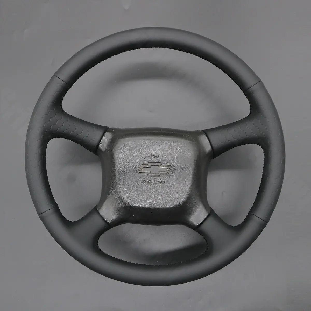 Griffowl Steering Wheel Cover for Bespoke Hatchback Chevrolet Chevy Express Astro 1999-2005. Elevate your interior with Griffowl's wrap and stitch kit.
