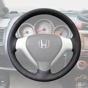 Griffowl Steering Wheel Cover for Bespoke Hatchback Honda Jazz Fit 2005-2008. Griffowl's interior mod with hand-sewn DIY steering wheel kit.