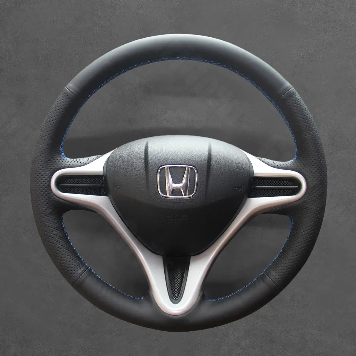 Griffowl Steering Wheel Cover for Bespoke Hatchback Honda Jazz Fit 2008-2015. Griffowl's interior mod with hand-sewn DIY steering wheel kit.