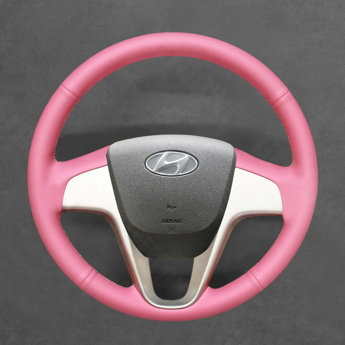 Griffowl Steering Wheel Cover for Bespoke Hatchback Hyundai i20 2008-2014. Perfect grip with our steering wheel wrap and custom interior touch.
