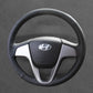 Griffowl Steering Wheel Cover for Bespoke Hatchback Hyundai i20 2008-2014. Perfect grip with our steering wheel wrap and custom interior touch.
