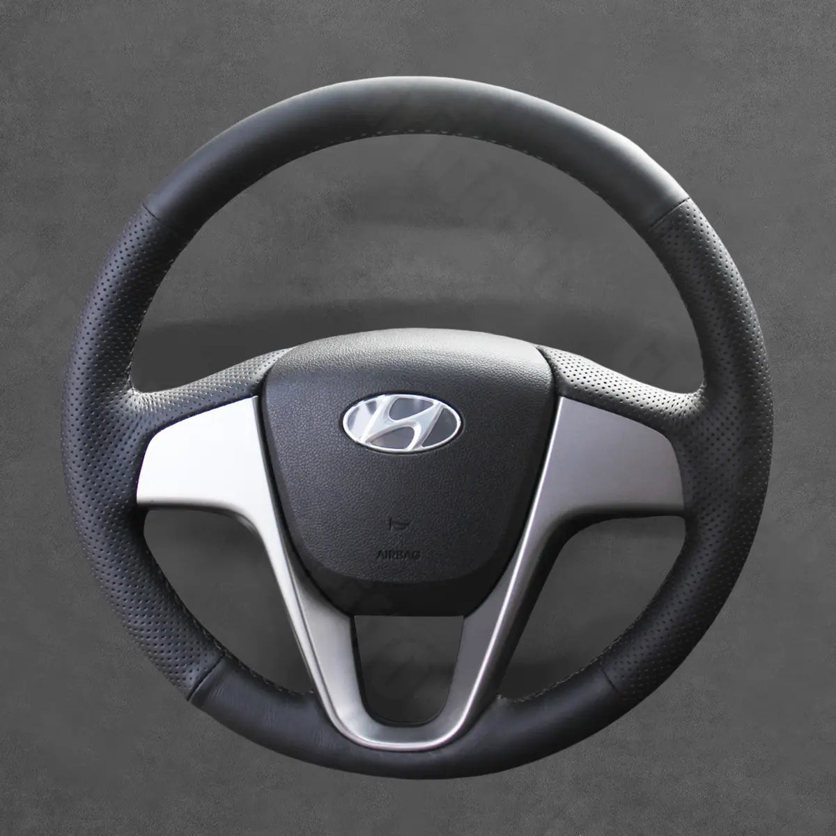 Griffowl Steering Wheel Cover for Bespoke Hatchback Hyundai i20 2008-2014. Perfect grip with our steering wheel wrap and custom interior touch.
