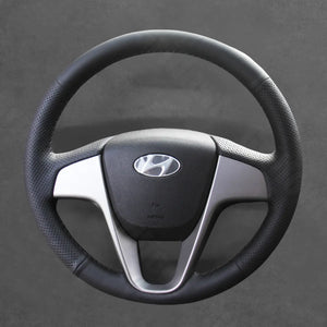 Griffowl Steering Wheel Cover for Bespoke Hatchback Hyundai i20 2008-2014. Perfect grip with our steering wheel wrap and custom interior touch.
