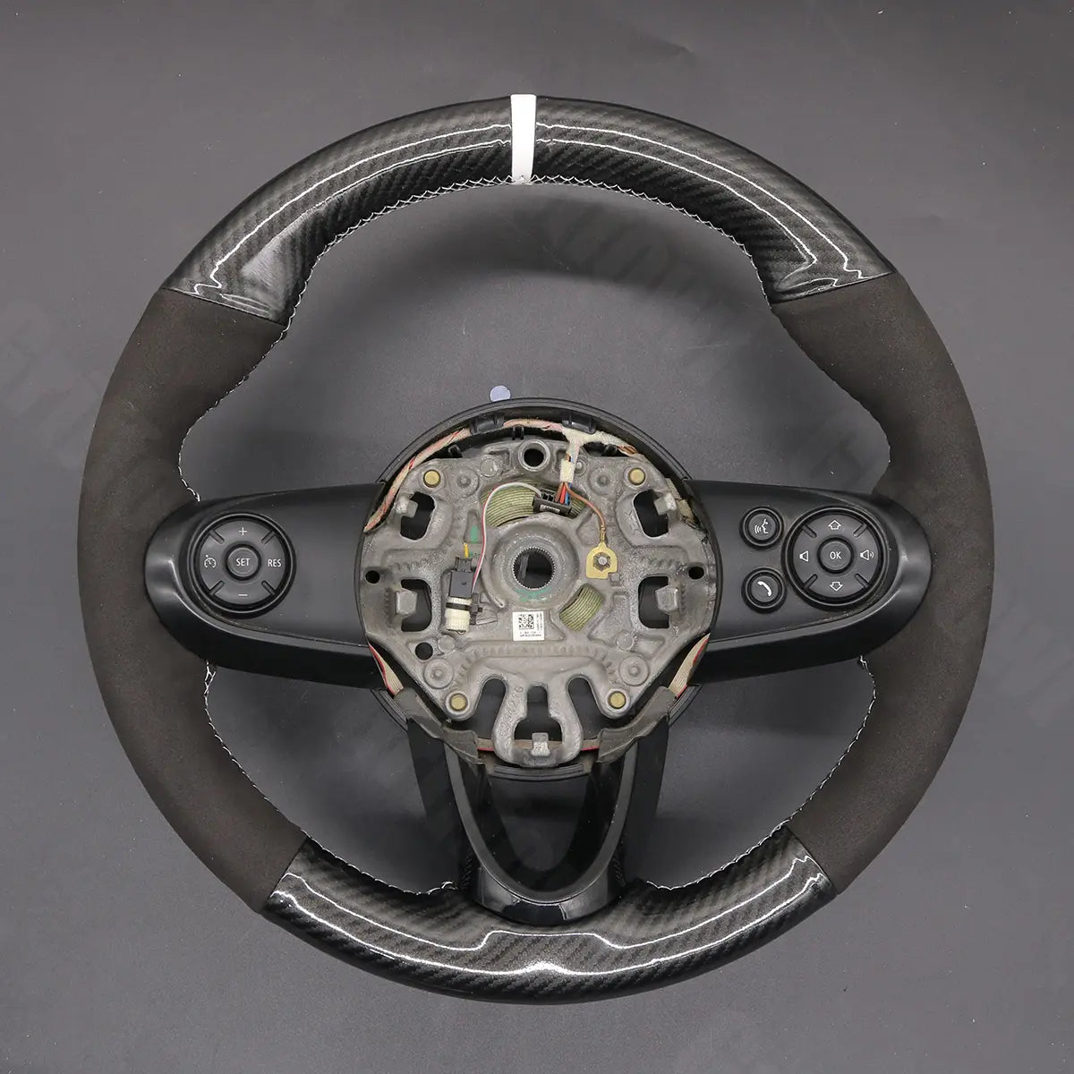 Griffowl Steering Wheel Cover for Bespoke Hatchback Mini Hardtop Clubman Hatchback 2014-2020. Elevate your interior with Griffowl's wrap and stitch kit.
