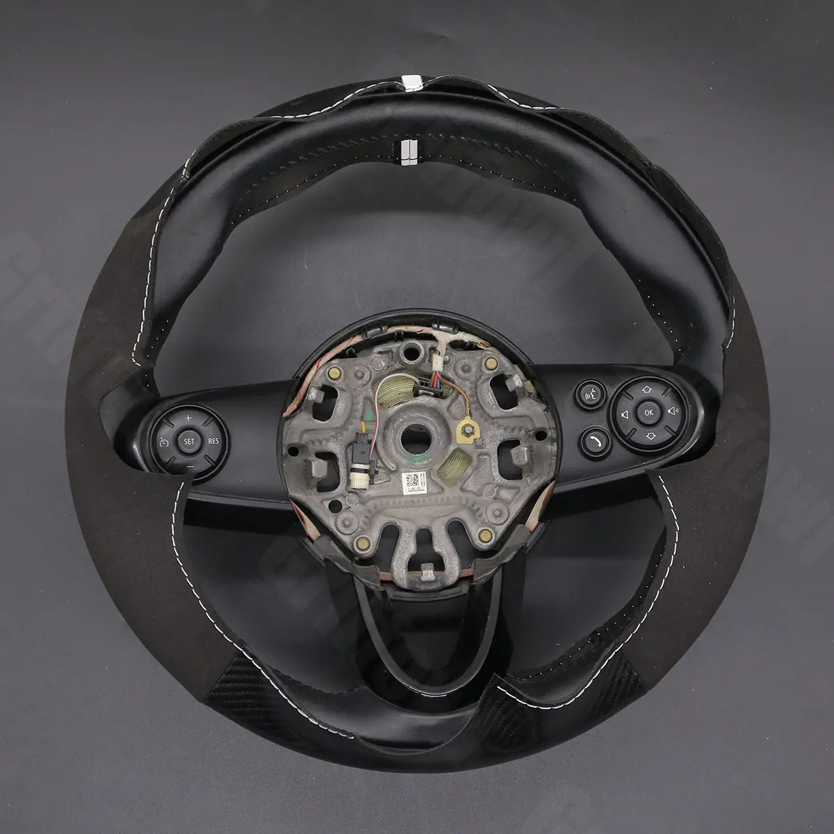 Griffowl Steering Wheel Cover for Bespoke Hatchback Mini Hardtop Clubman Hatchback 2014-2020. Elevate your interior with Griffowl's wrap and stitch kit.
