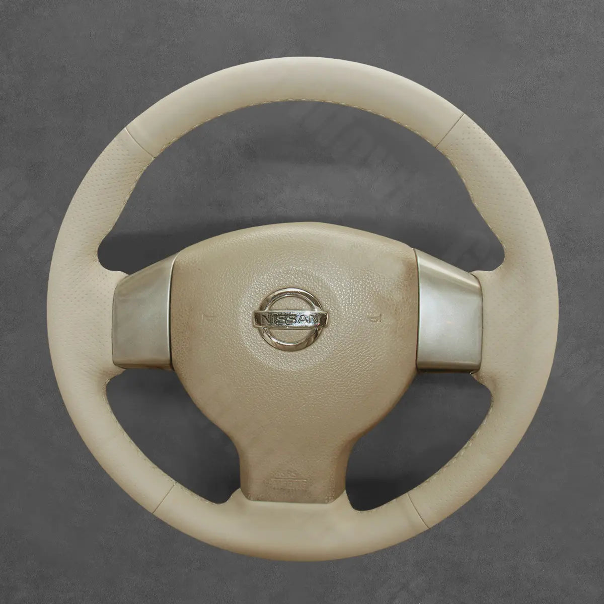 Griffowl Steering Wheel Cover for Bespoke Hatchback Nissan Note Versa Note Tiida 2004-2012. Elevate your interior with Griffowl's wrap and stitch kit.
