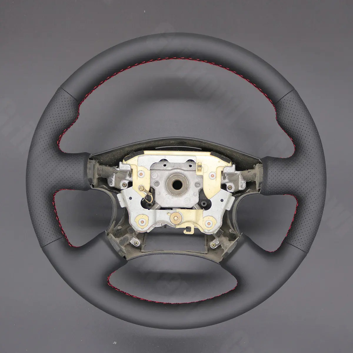 Griffowl Steering Wheel Cover for Bespoke Hatchback Nissan Pulsar N16 Serena Caravan 2000-2003. Elevate your interior with Griffowl's wrap and stitch kit.
