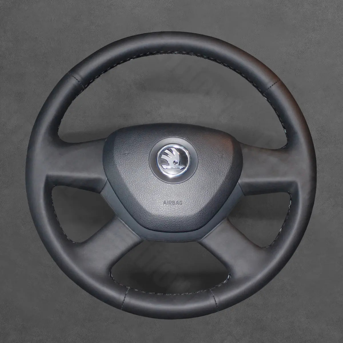 Griffowl Steering Wheel Cover for Bespoke Hatchback Skoda Octavia Fabia 2013-2014. For refined interior upgrades using our wrap and stitch kit.
