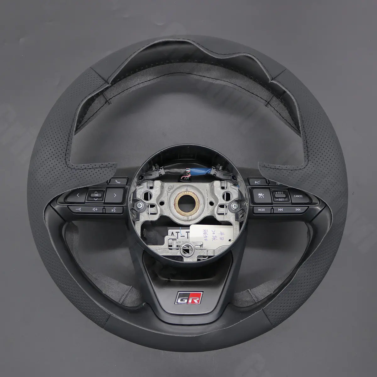 Griffowl Steering Wheel Cover for Bespoke Hatchback Toyota Aygo X Yaris IV XP210 Cross 2022-2025. Perfect grip with our steering wheel wrap and custom interior touch.