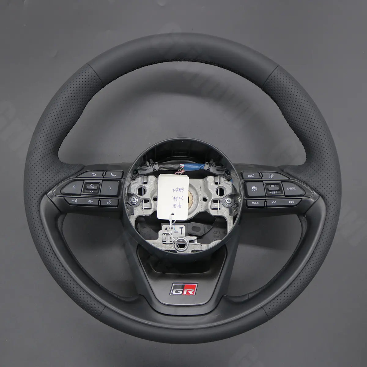 Griffowl Steering Wheel Cover for Bespoke Hatchback Toyota Aygo X Yaris IV XP210 Cross 2022-2025. Perfect grip with our steering wheel wrap and custom interior touch.