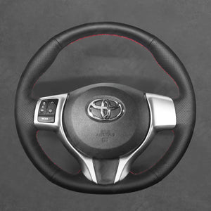 Griffowl Steering Wheel Cover for Bespoke Hatchback Toyota-Verso-S-Yaris. Griffowl's interior mod with hand-sewn DIY steering wheel kit.