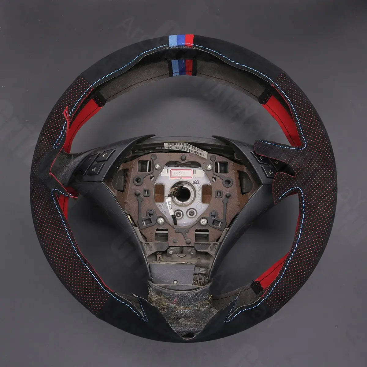 Griffowl Steering Wheel Cover for Crafted Touring BMW 5 Series E61 2004-2009. Griffowl's interior mod with hand-sewn DIY steering wheel kit.