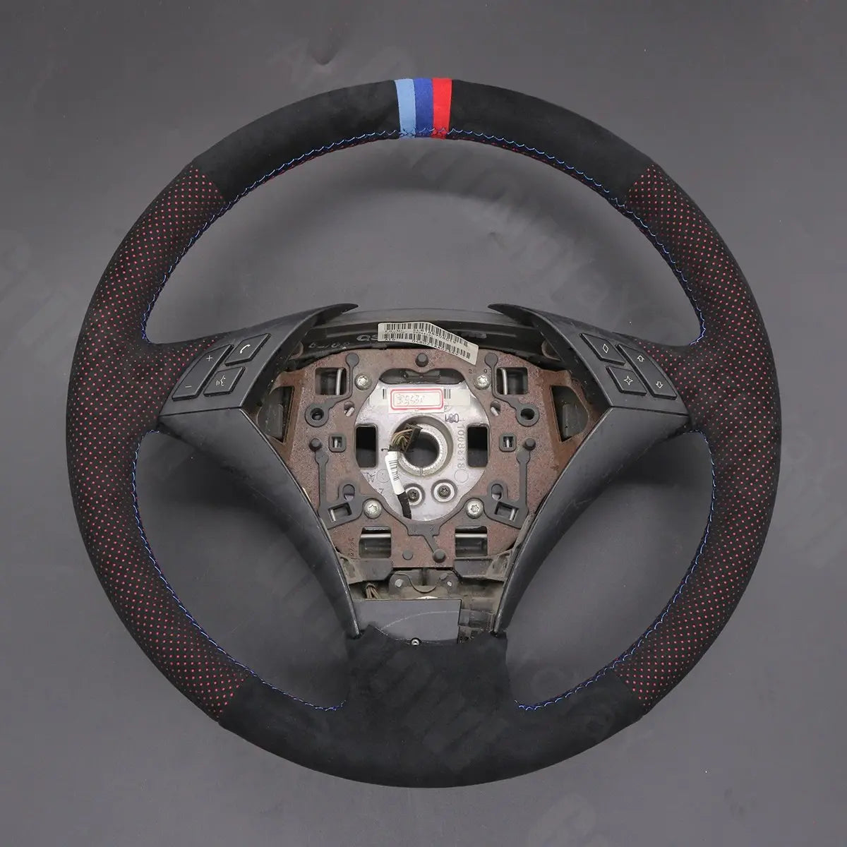 Griffowl Steering Wheel Cover for Crafted Touring BMW 5 Series E61 2004-2009. Griffowl's interior mod with hand-sewn DIY steering wheel kit.