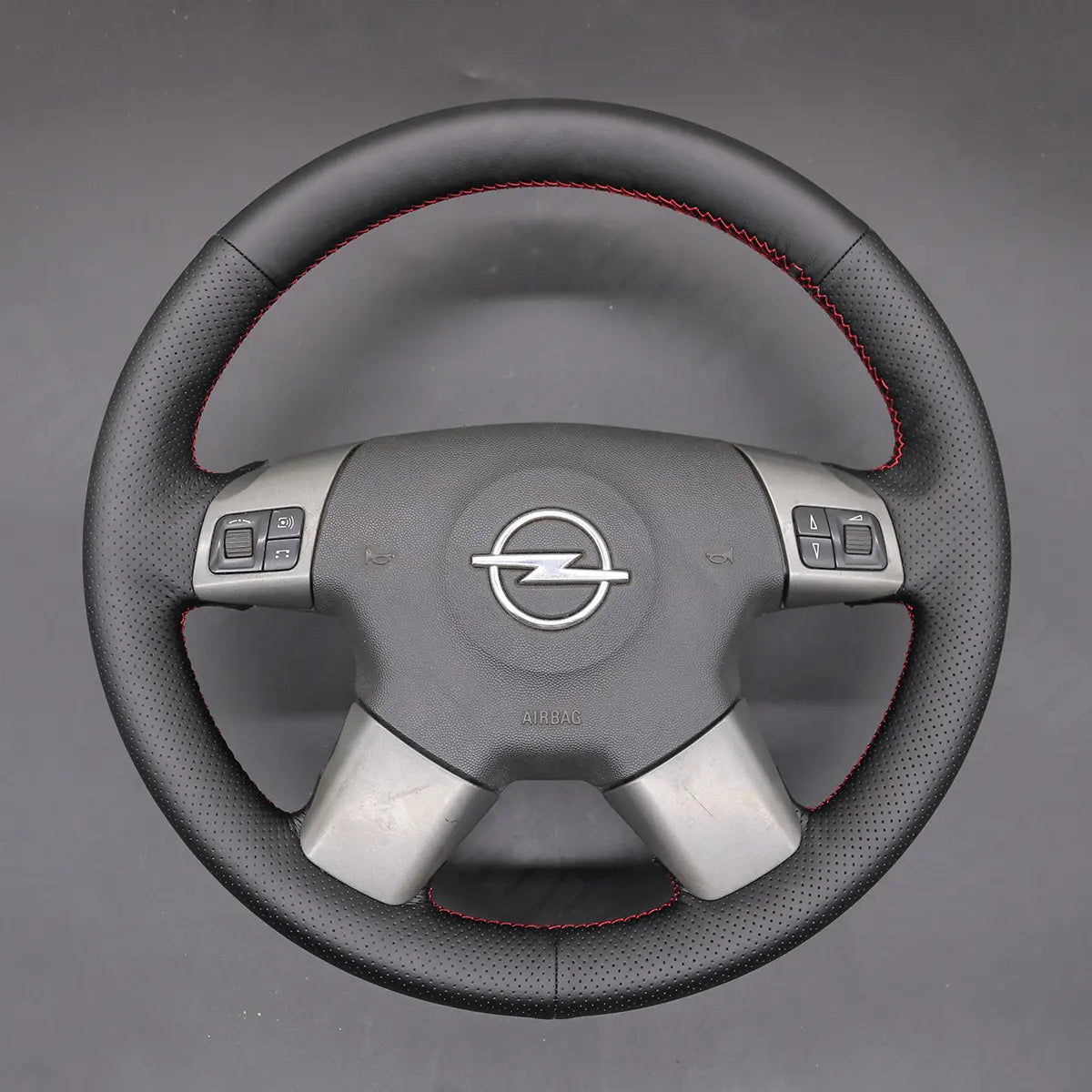 Griffowl Steering Wheel Cover for Crafted Touring Opel Vectra C 2002-2005. Perfect grip with our steering wheel wrap and custom interior touch.
