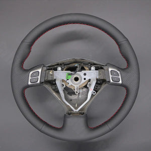 Griffowl Steering Wheel Cover for Crafted Touring Subaru Outback Mutifunction button 2005-2007. Elevate your interior with Griffowl's wrap and stitch kit.
