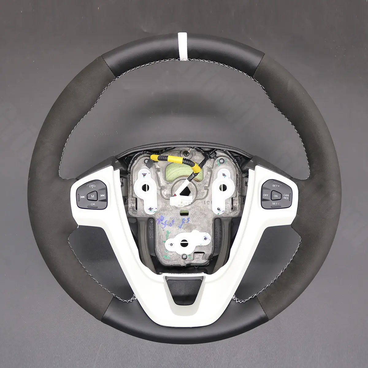Griffowl Steering Wheel Cover for Customized Sedan Ford Fiesta Mk7 ST 2014-2019. For refined interior upgrades using our wrap and stitch kit.