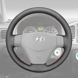 Griffowl Steering Wheel Cover for Customized Sedan Hyundai Accent 2006-2011. Perfect grip with our steering wheel wrap and custom interior touch.
