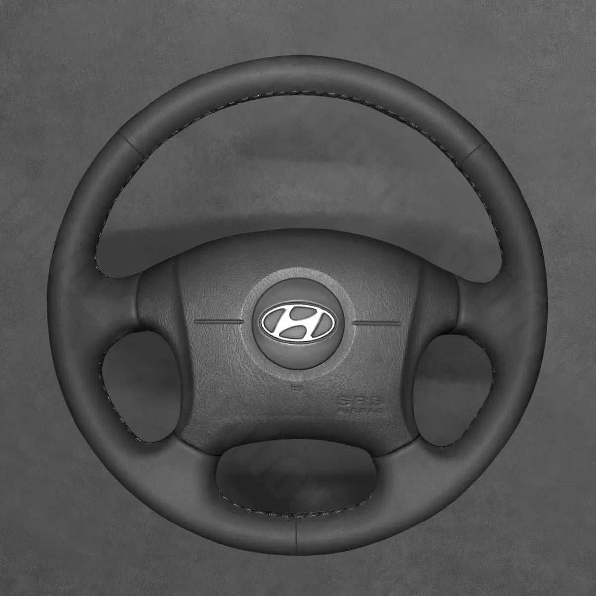 Griffowl Steering Wheel Cover for Customized Sedan Hyundai Elantra 2001-2006. Griffowl's interior mod with hand-sewn DIY steering wheel kit.

