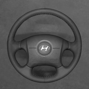 Griffowl Steering Wheel Cover for Customized Sedan Hyundai Elantra 2001-2006. Griffowl's interior mod with hand-sewn DIY steering wheel kit.
