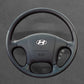 Griffowl Steering Wheel Cover for Customized Sedan Hyundai Sonata 1999-2005. Perfect grip with our steering wheel wrap and custom interior touch.
