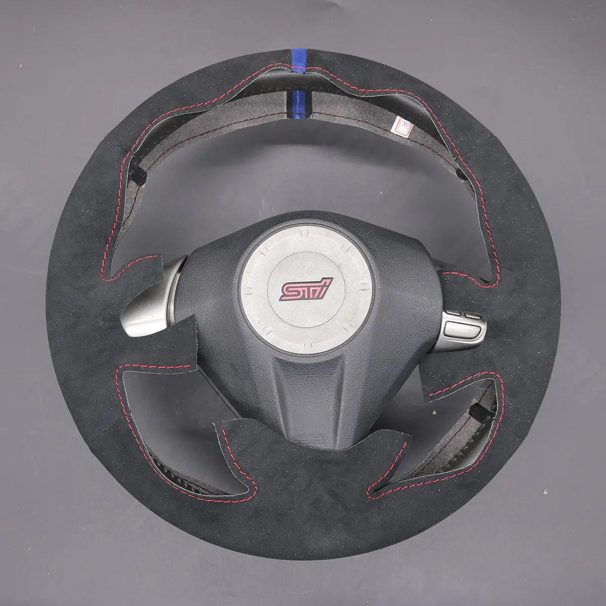 Griffowl Steering Wheel Cover for Customized Sedan Subaru Impreza WRX 2007-2010. For refined interior upgrades using our wrap and stitch kit.
