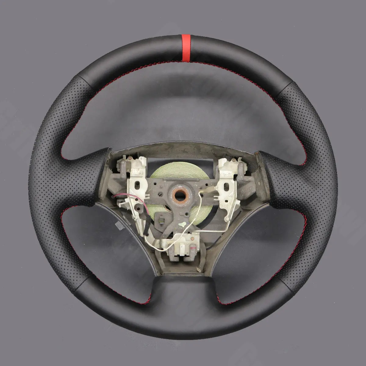 Griffowl Steering Wheel Cover for Customized Sedan Toyota Corolla Verso 2002-2004. For refined interior upgrades using our wrap and stitch kit.