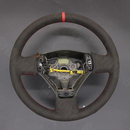 Griffowl Steering Wheel Cover for Customized Sedan Volkswagen VW Bora 2000-2005. For refined interior upgrades using our wrap and stitch kit.
