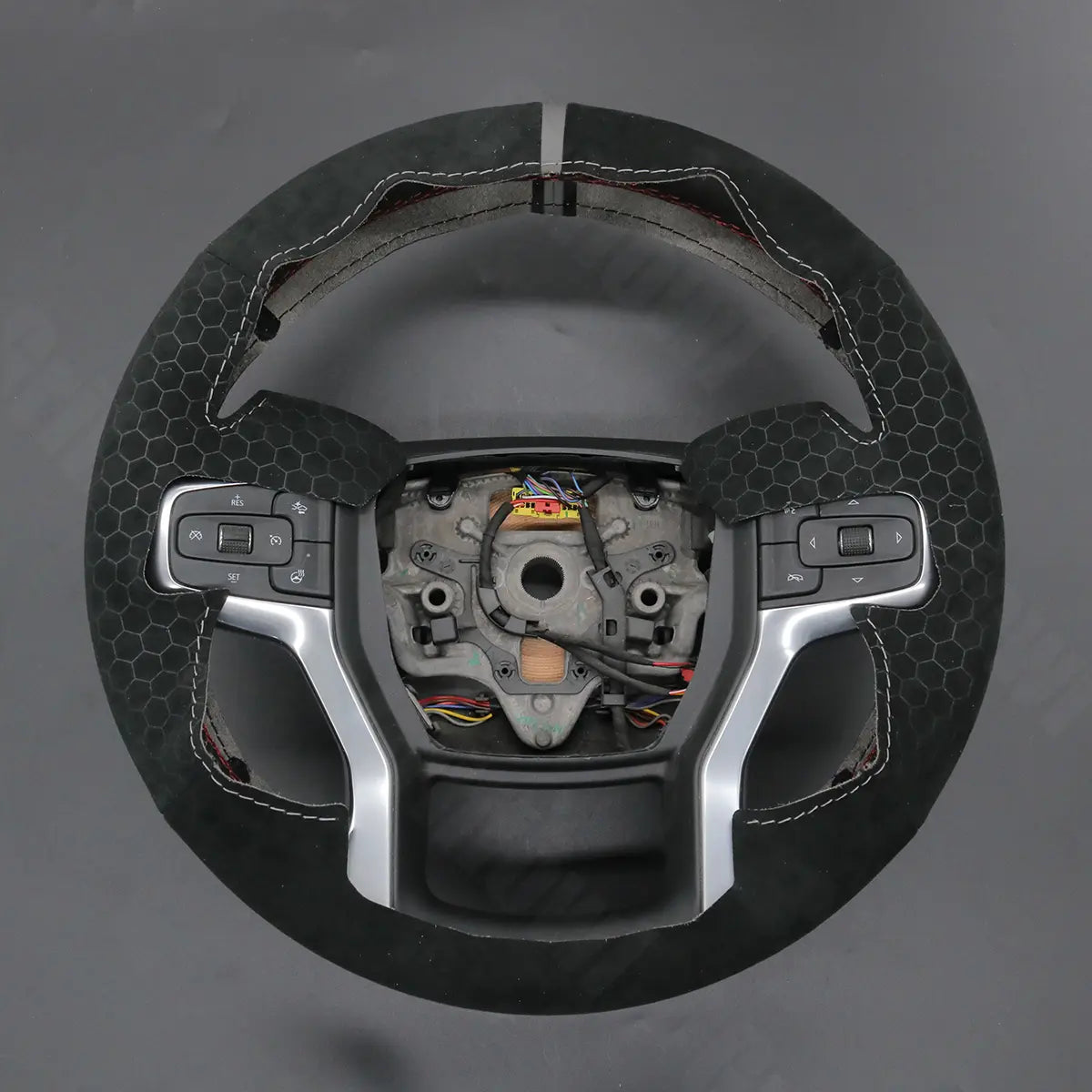 Griffowl Steering Wheel Cover for DIY Pickup Chevrolet Chevy Silverado 1500 2500 3500 2020-2025. Hand-sewn DIY kit blends grip, function, and style inside.

