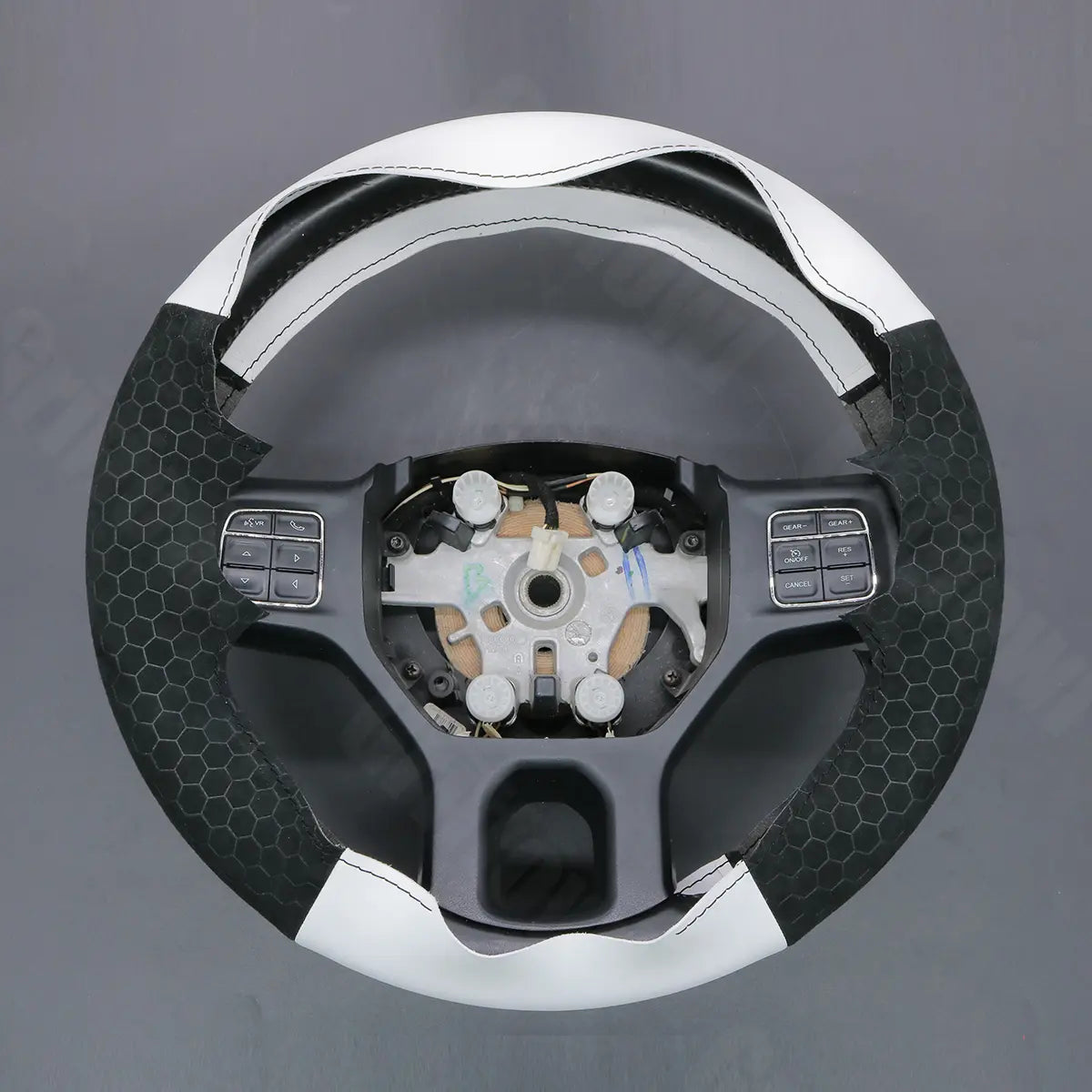Griffowl Steering Wheel Cover for DIY Pickup Dodge RAM 1500 Classic 2500 3500 5500 2012-2018. Elevate your interior with Griffowl's wrap and stitch kit.
