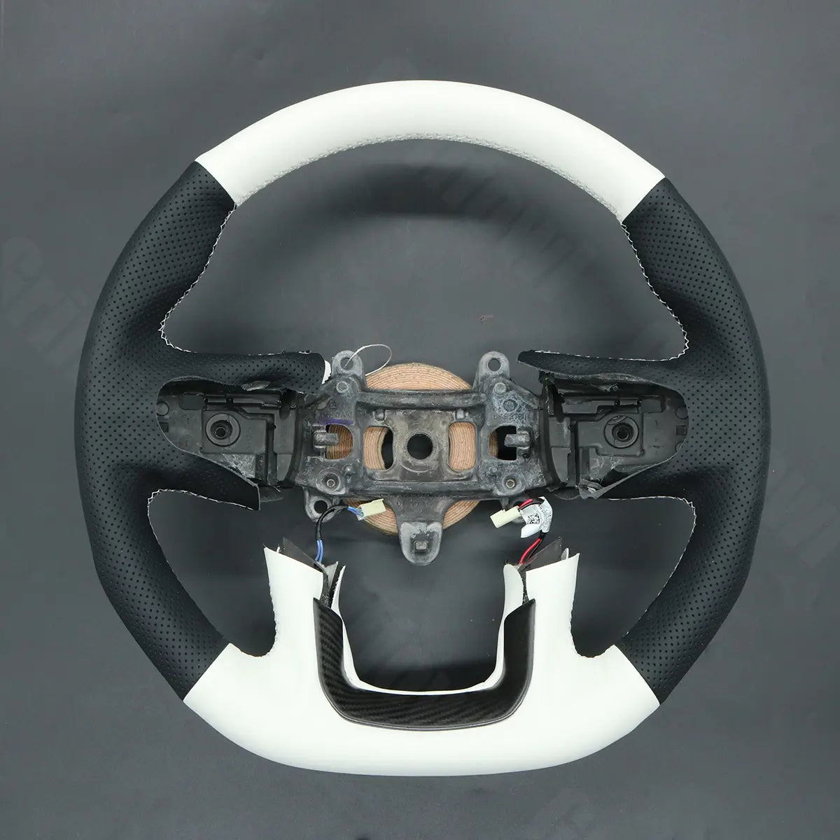 Griffowl Steering Wheel Cover for DIY Pickup Dodge RAM 1500 TRX GT RHO 2021-2025. For refined interior upgrades using our wrap and stitch kit.

