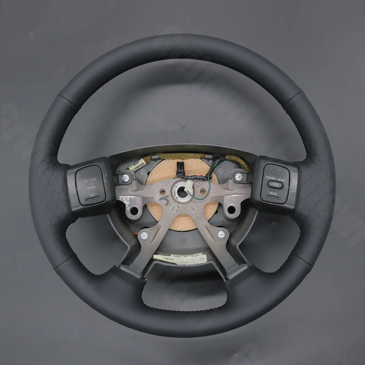 Griffowl Steering Wheel Cover for DIY Pickup Dodge Ram SRT-10 Dakota 1500 2500 3500 2004-2011. Elevate your interior with Griffowl's wrap and stitch kit.
