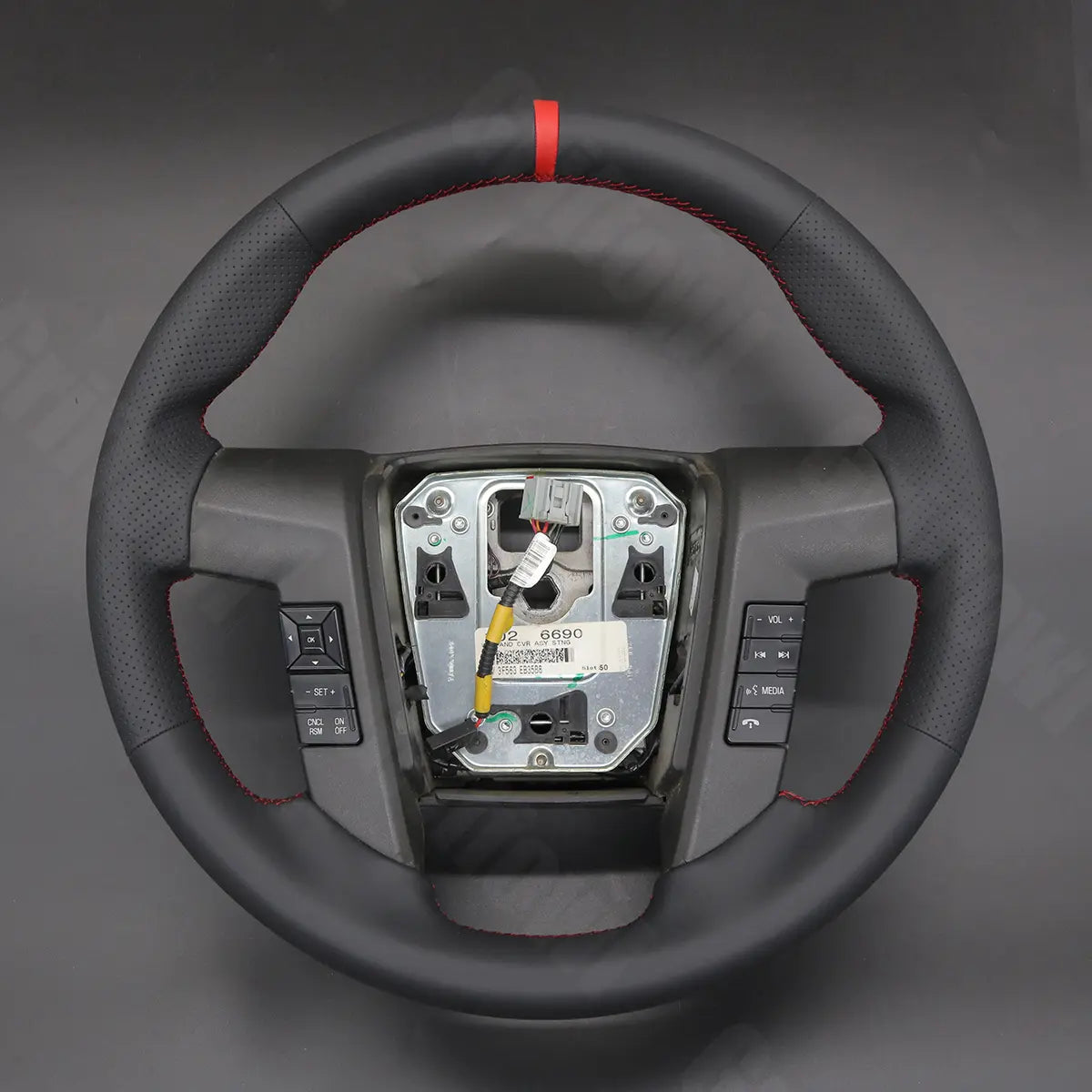 Griffowl Steering Wheel Cover for DIY Pickup Ford F-150 F150 Raptor 2010-2015. Griffowl's interior mod with hand-sewn DIY steering wheel kit.