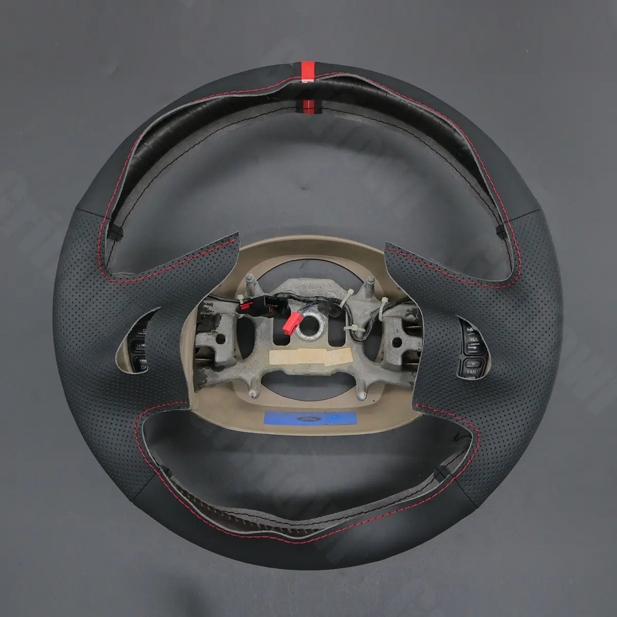 Griffowl Steering Wheel Cover for DIY Pickup Ford F-250 F-350 F-450 F-550 XL 1999-2007. Elevate your interior with Griffowl's wrap and stitch kit.