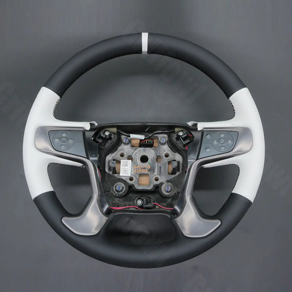 Griffowl Steering Wheel Cover for DIY Pickup GMC Sierra 1500 Limited 2500 3500 2015-2019. Elevate your interior with Griffowl's wrap and stitch kit.