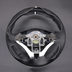 Griffowl Steering Wheel Cover for DIY Pickup Mitsubishi L200 Triton 2006-2015. Griffowl's interior mod with hand-sewn DIY steering wheel kit.
