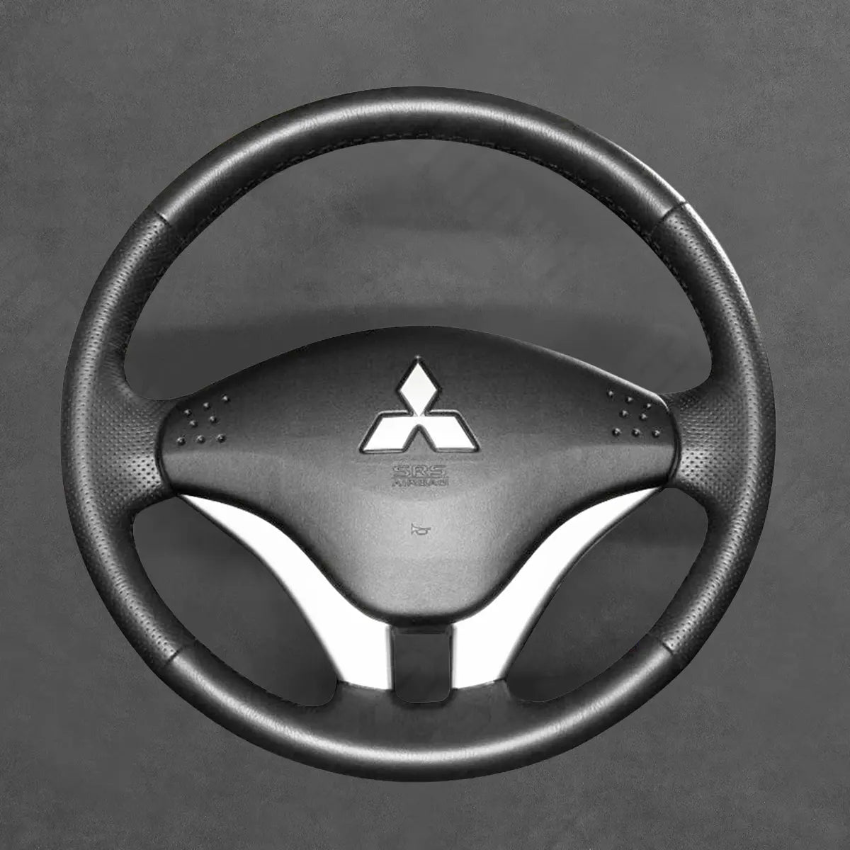 Griffowl Steering Wheel Cover for DIY Pickup Mitsubishi L200 Triton 2006-2015. Griffowl's interior mod with hand-sewn DIY steering wheel kit.
