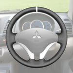 Griffowl Steering Wheel Cover for DIY Pickup Mitsubishi L200 Triton 2006-2015. Griffowl's interior mod with hand-sewn DIY steering wheel kit.
